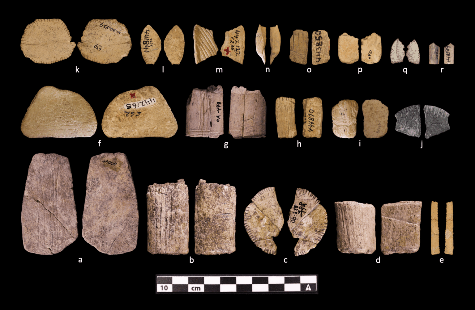 A figure from a researche paper showing more examples of ancient dice, this time with both faces of 18 examples.